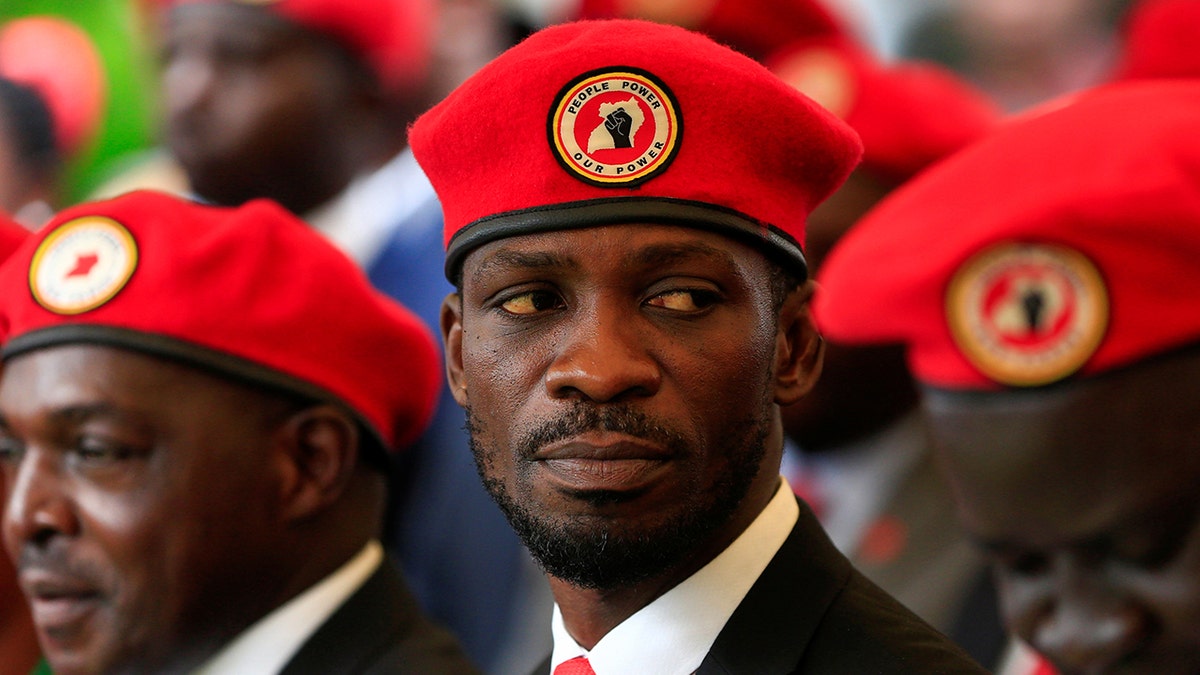 Wine, a musician turned politician, has called the government's ban on his red berets "a sham." REUTERS/James Akena