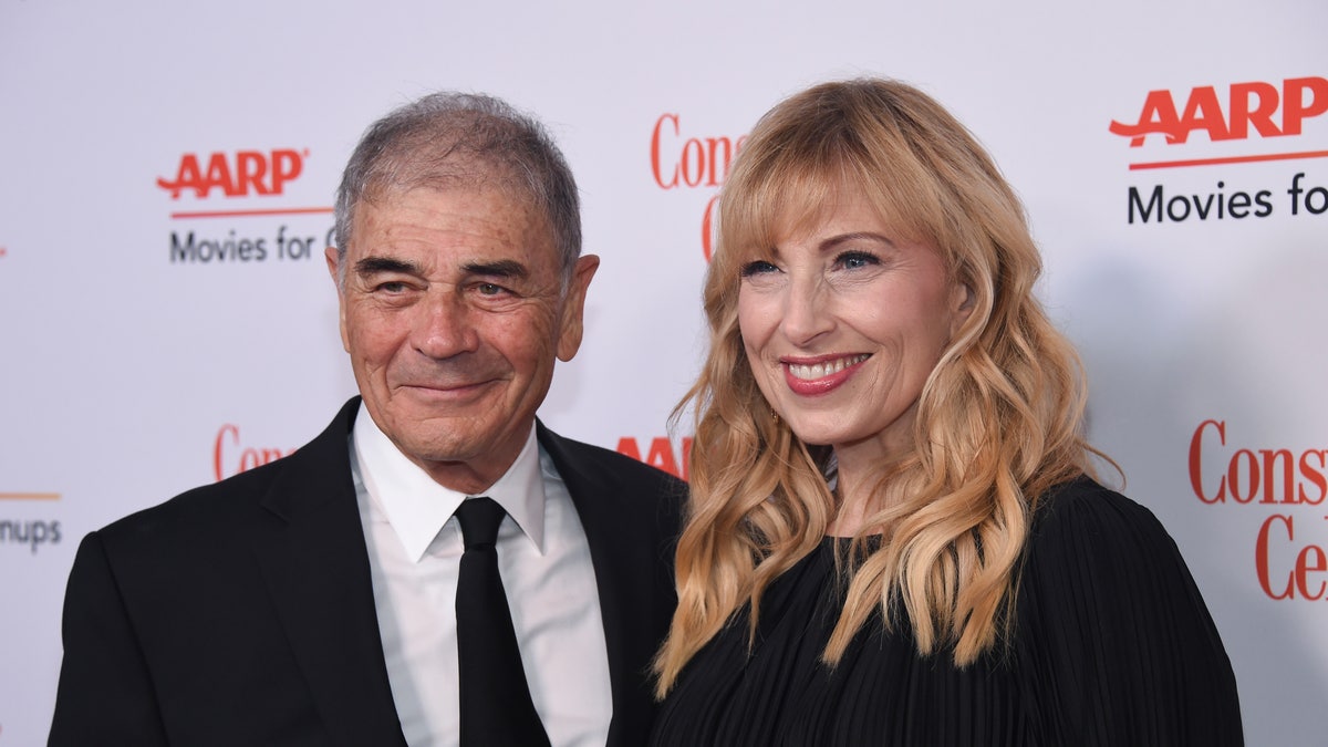 Robert Forster, left, and Denise Grayson attend the 18th Annual Movies For Grownups Awards at Beverly Wilshire Hotel, in Beverly Hills, Calif. Forster, the handsome character actor who got a career resurgence and Oscar-nomination for playing bail bondsman Max Cherry in "Jackie Brown," has died at age 78. Forster's agent Julia Buchwald says he died Friday, Oct. 11, 2019, at home in Los Angeles of brain cancer. (Photo by Phil McCarten/Invision/AP, File)