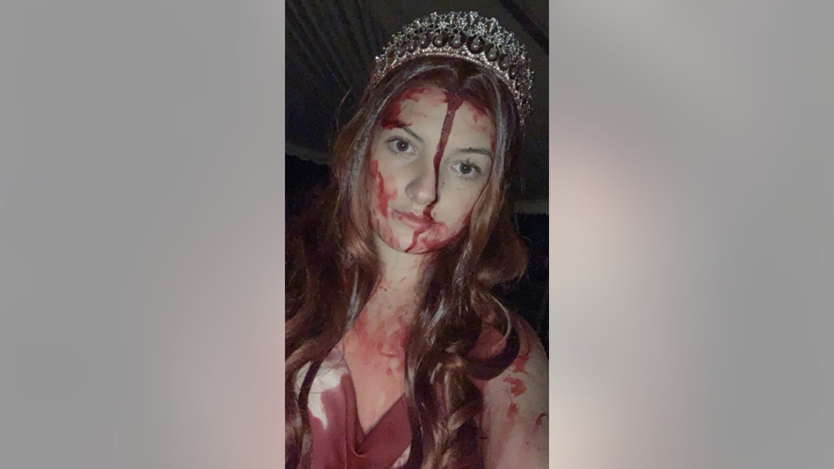 Student Sidney Wolfe gave first responders a scare when she totaled her car and they arrived to see her covered in fake blood from her "Carrie" costume.