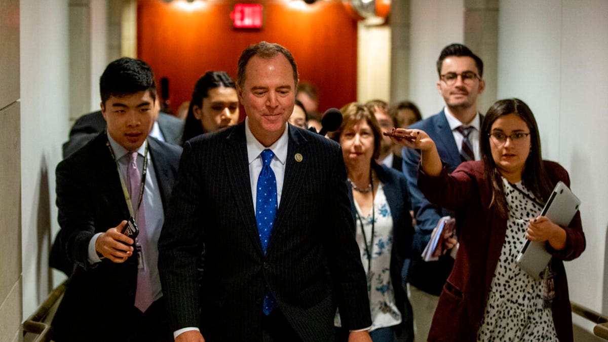 House Intelligence Committee Chairman Rep. Adam Schiff of Calif., leaves a secure area where Deputy Assistant Secretary of Defense Laura Cooper is testifying as part of the House impeachment inquiry into President Donald Trump, Wednesday, Oct. 23, 2019, on Capitol Hill in Washington. (AP Photo/Patrick Semansky)