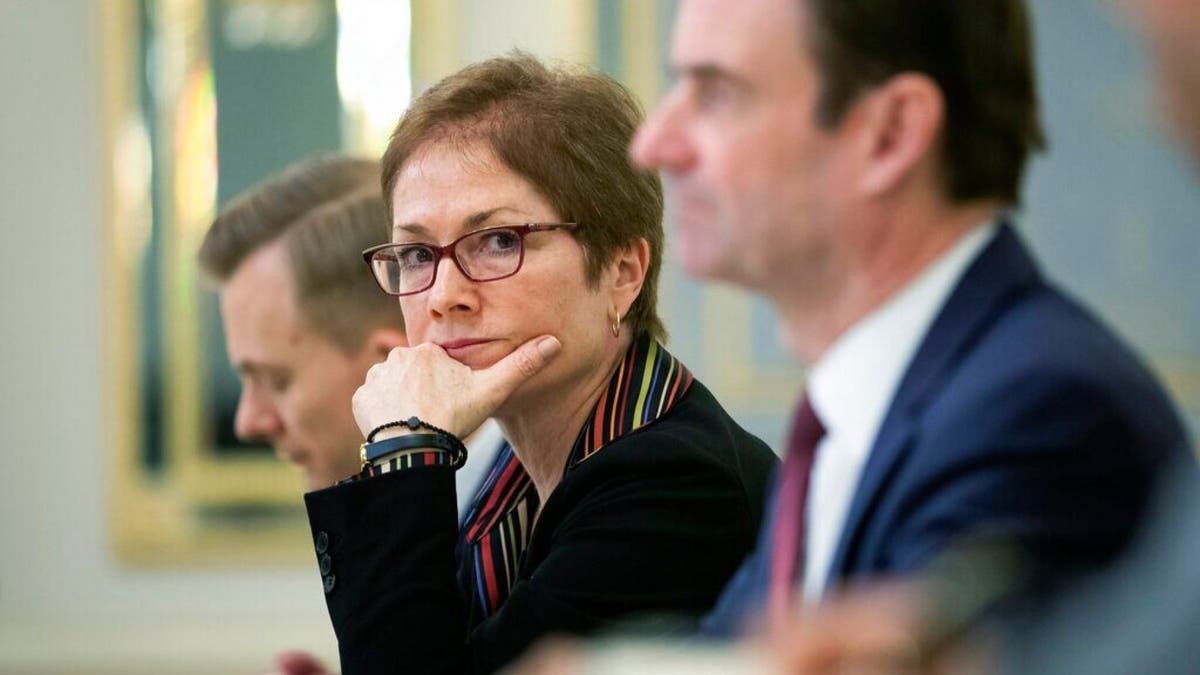 Former U.S. Ambassador to Ukraine Marie Yovanovitch, center, is set to testify on Friday on Capitol Hill. (Mikhail Palinchak, Presidential Press Service Pool Photo via AP)