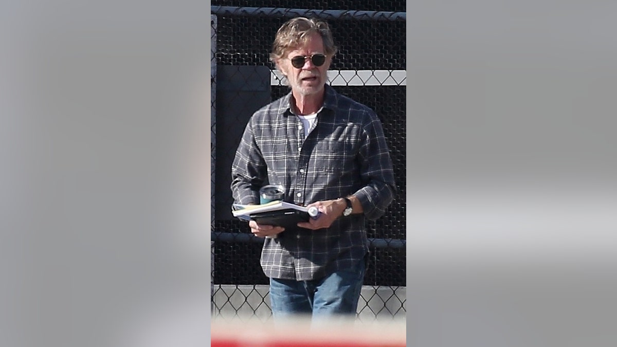 William H. Macy back filming "Shameless" as his wife Felicity Human spends two weeks in federal prison.