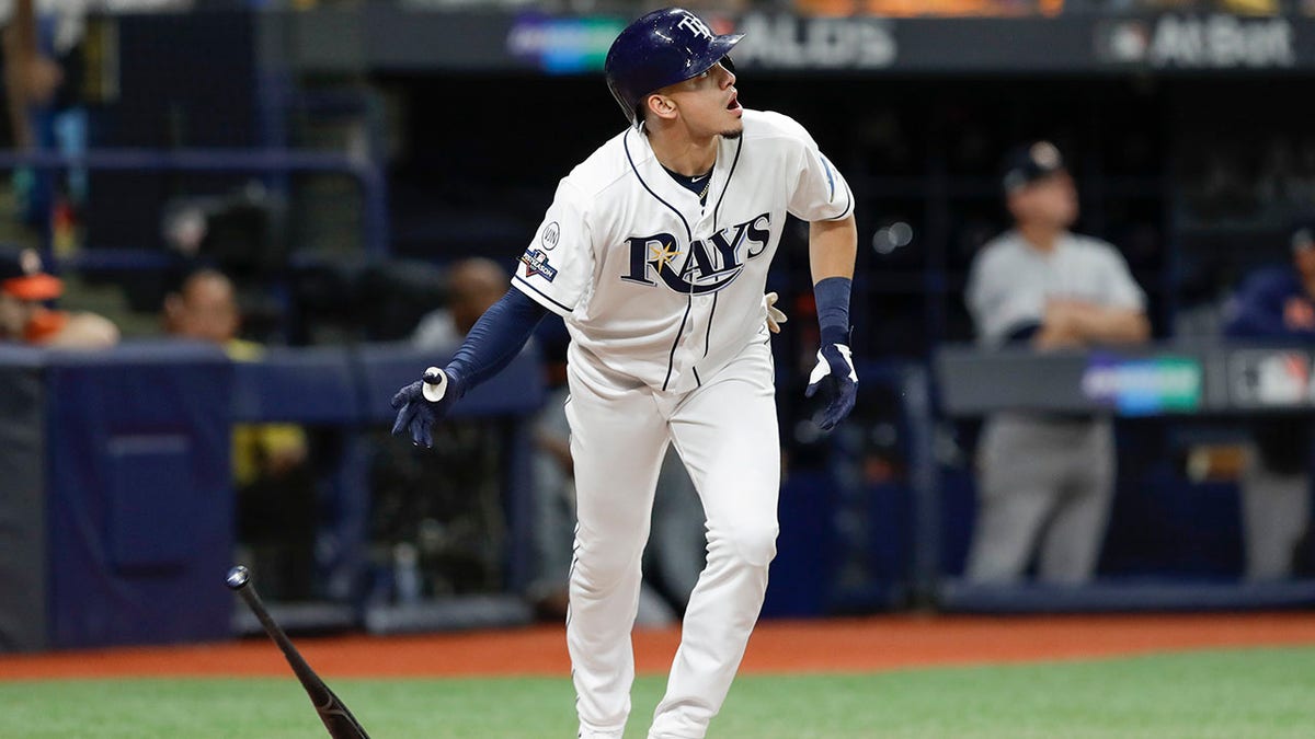 Tampa Bay Rays' Willy Adames watches his solo home run against the Houston Astros in the fourth inning of Game 4 of a baseball American League Division Series, Tuesday, Oct. 8, 2019, in St. Petersburg, Fla. (Associated Press)