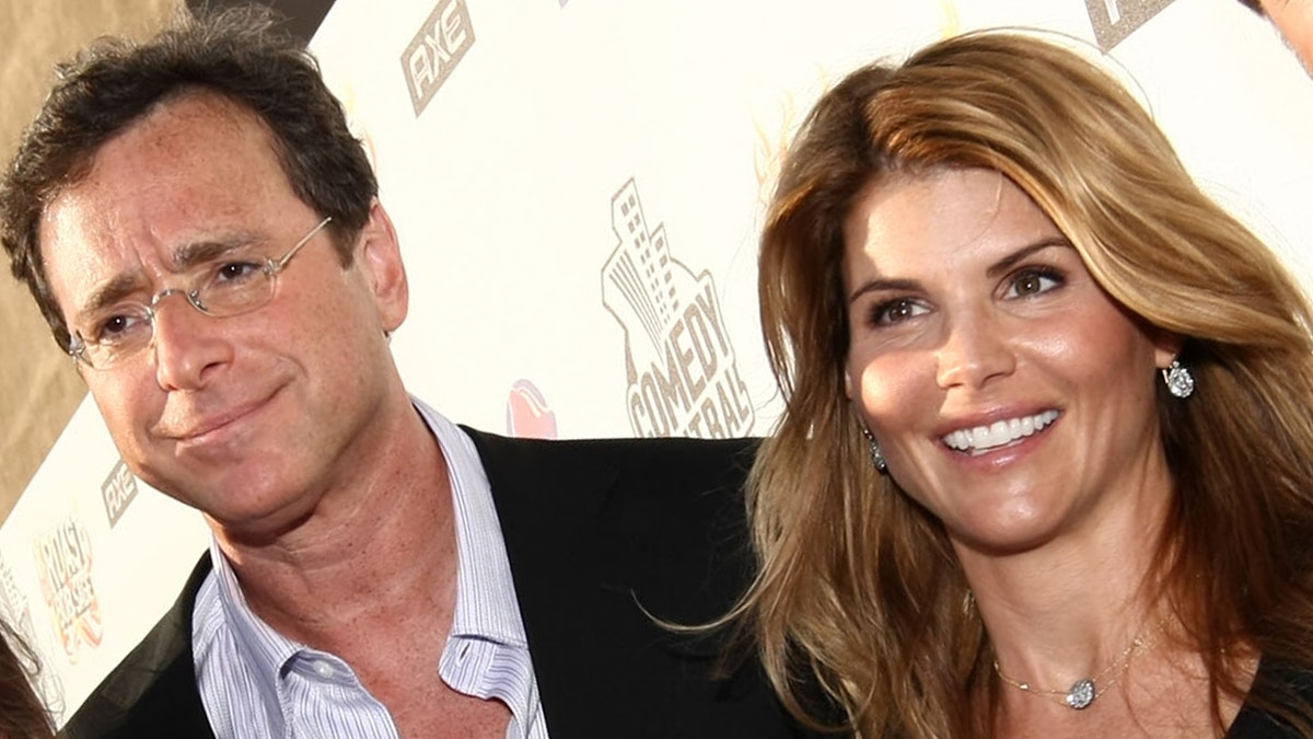 Bob Saget revealed on Tuesday he adores Lori Loughlin despite her involvement in the college admissions scandal.
