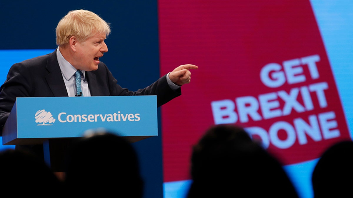 Britain's Prime Minister Boris Johnson delivers his Leader's speech at the Conservative Party Conference in Manchester, England, on Wednesday. (AP)