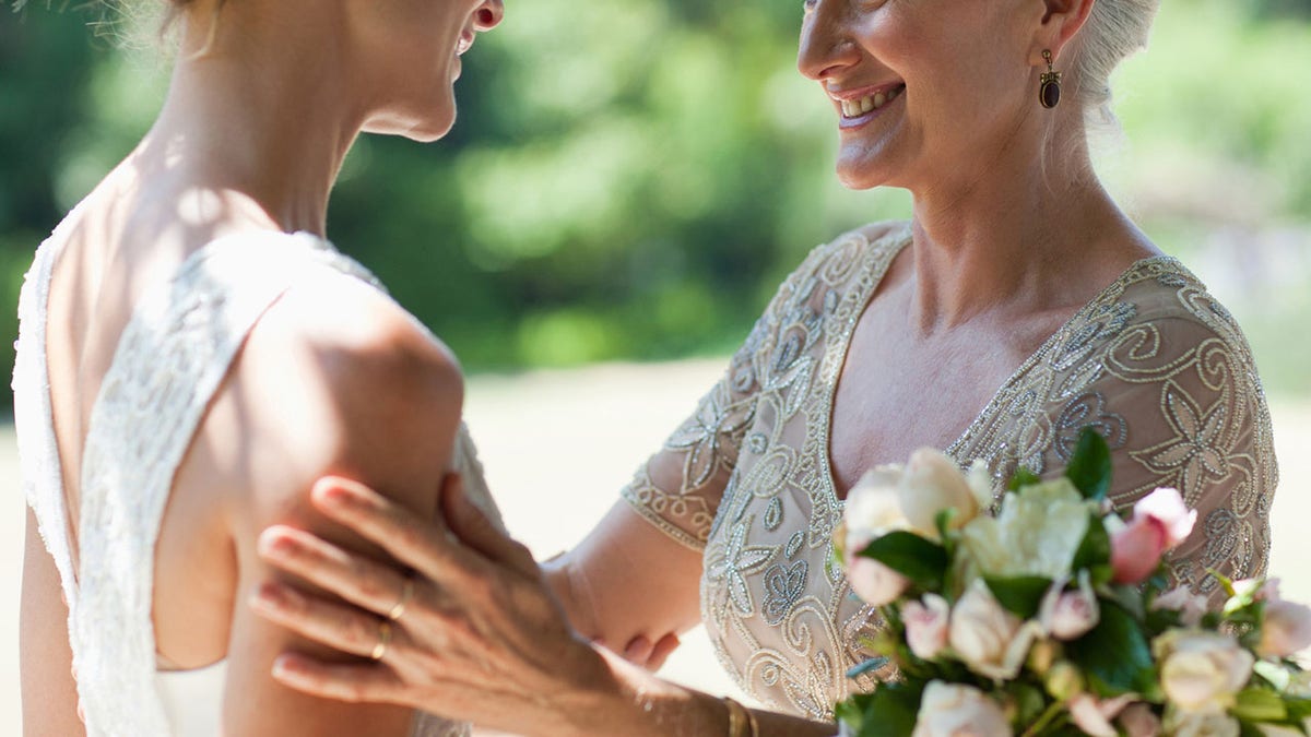 Writing that the “beautiful” ceremony and reception were “so much fun,” the bride revealed that she was called out by her mother-in-law after the big event – as the groom’s mom didn’t know that the couple had legally married months before.