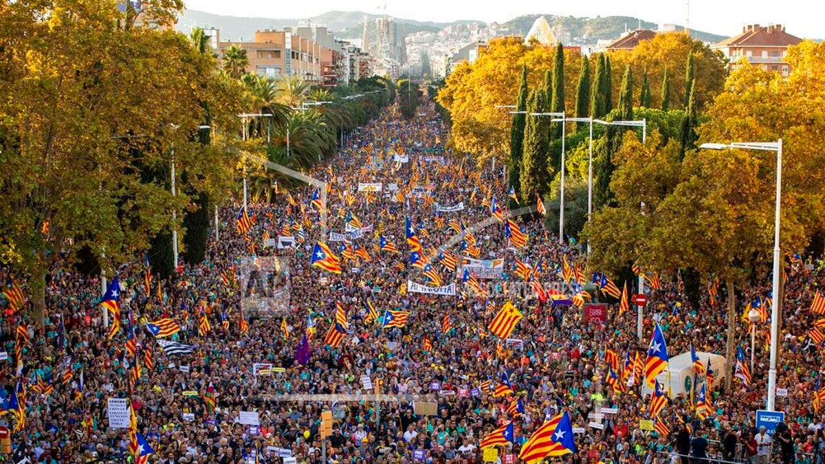Catalan pro-independence protesters march during a demonstration in Barcelona, Spain, Saturday, Oct. 26, 2019.(AP Photo/Emilio Morenatti)