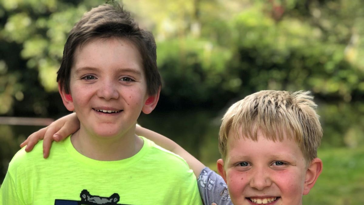 Oliver (left), pictured here with his brother, has undergone two bone marrow transplants.
