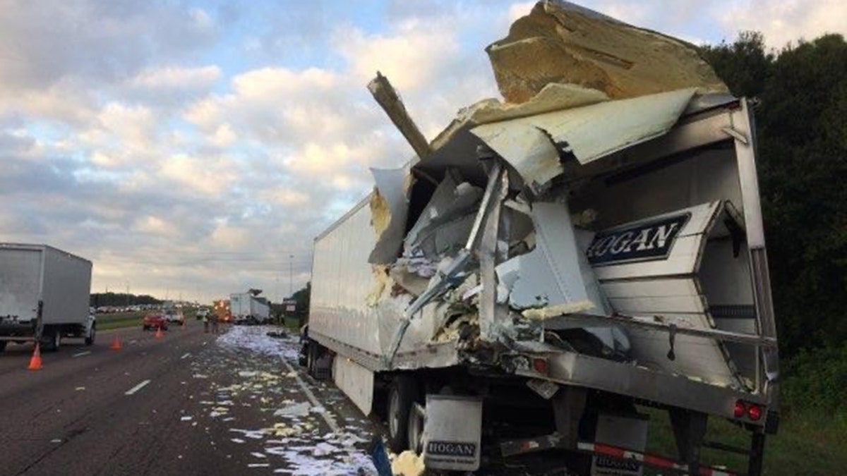 A tractor-trailer carrying mail on Monday crashed into another tractor-trailer on Interstate 75 in Florida, officials said.
