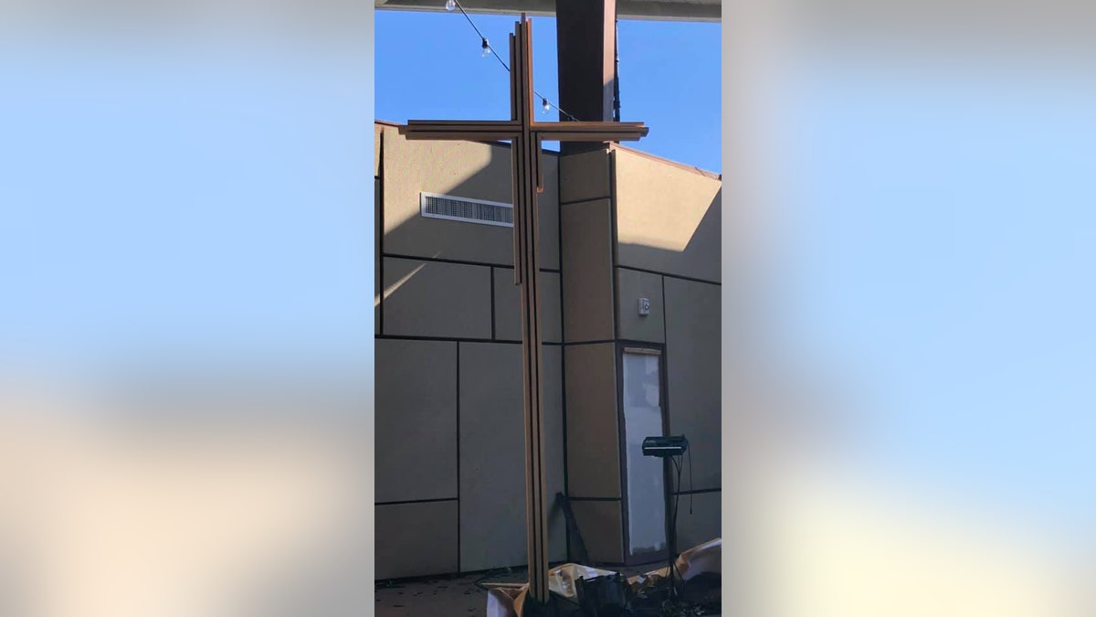 While Northway Church had its roof torn off and much of the building was destroyed after Sunday's F-3 tornado, a wooden cross stood, seen as a symbol of hope for the community.