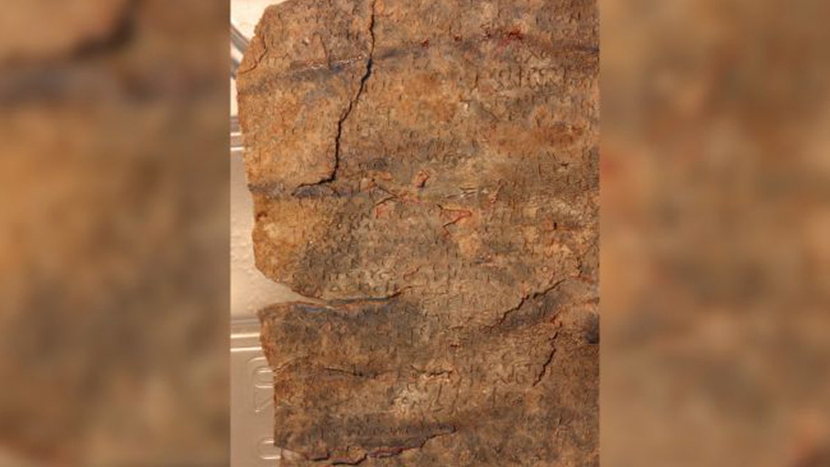 This recently deciphered 1,500-year-old curse tablet is written in Greek on a lead tablet. The curse is directed at a dancer named Manna. (Image: © Attilio Mastrocinque)