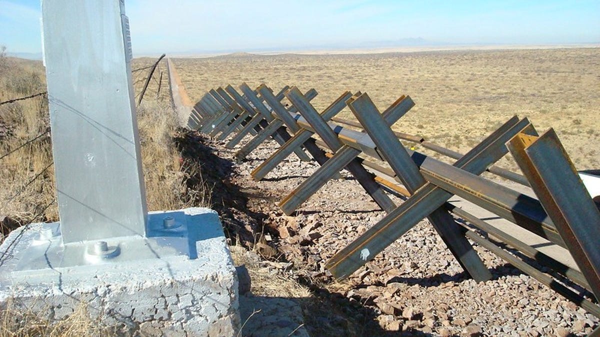 Vehicle barriers that have already been replaced with a 30-foot wall along many miles of the border (Courtesy CBP)