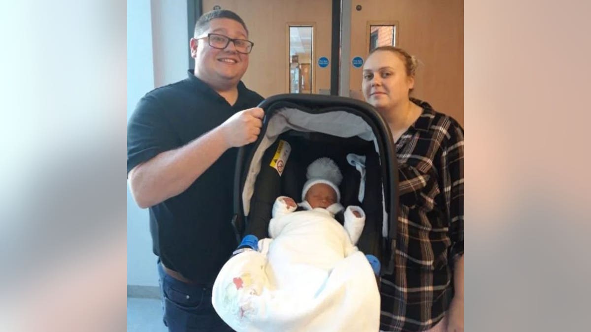 Jodie Marsden, 27 with husband Matt, 34, and baby Arthur.