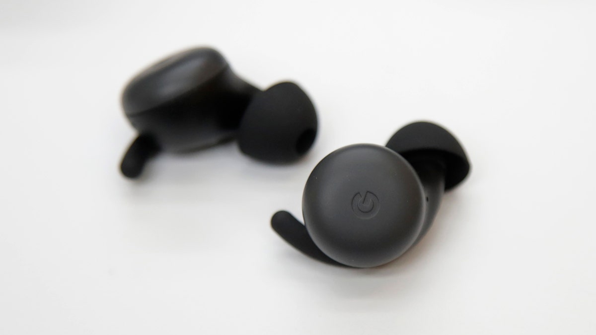 In this Tuesday, Sept. 24, 2019, photo Pixel buds are displayed at Google in Mountain View, Calif. (AP Photo/Jeff Chiu)