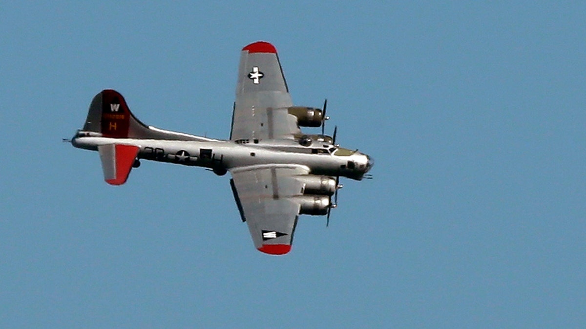 In this June 6, 2016 file photo, a World War II-era Boeing B-17 Flying Fortress airplane banks in the air as it comes in for a landing in Seattle on the anniversary of D-Day. Aa B-17 plane crashed Wednesday at Bradley International Airport north of Hartford in Windsor Locks, Conn.