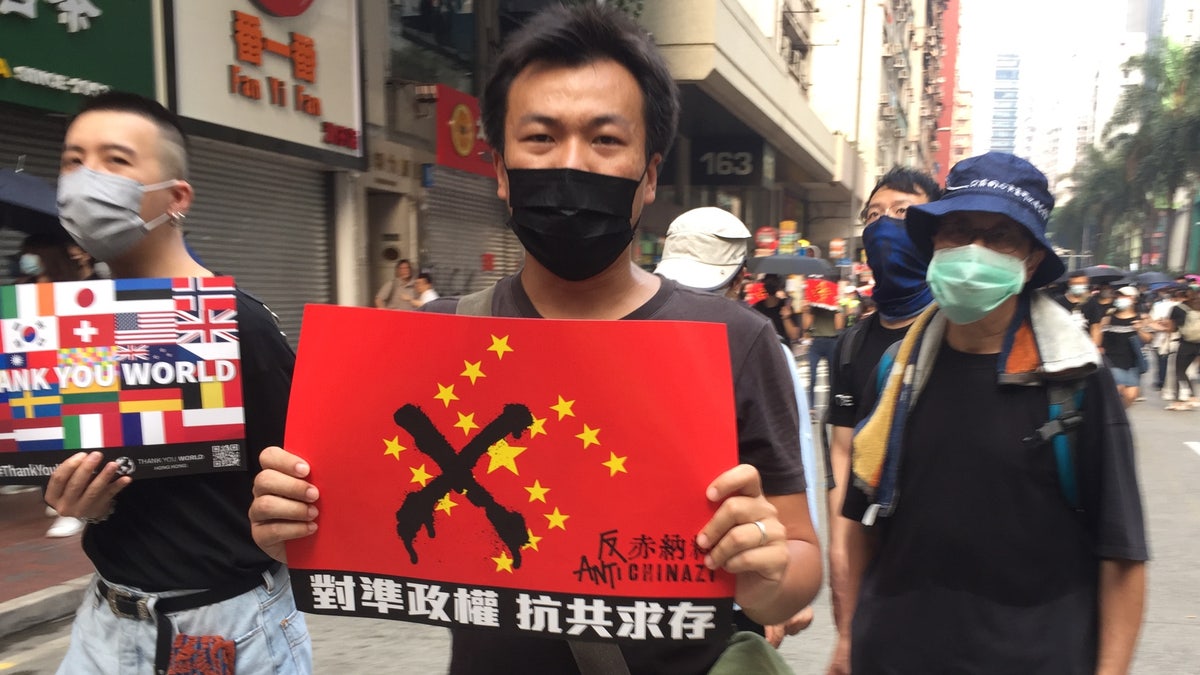 Tuesday’s protest, coinciding with China’s National Day, was described by officials as the worst for Hong Kong. Activists hurled gas bombs and rocks.?Police responded with water cannons, rubber bullets and, in one case, a real one that injured a protester.?