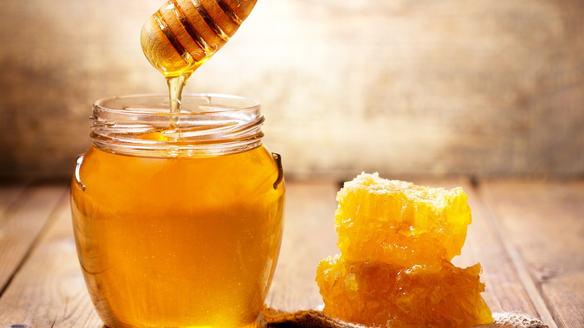jar of honey and honeycomb