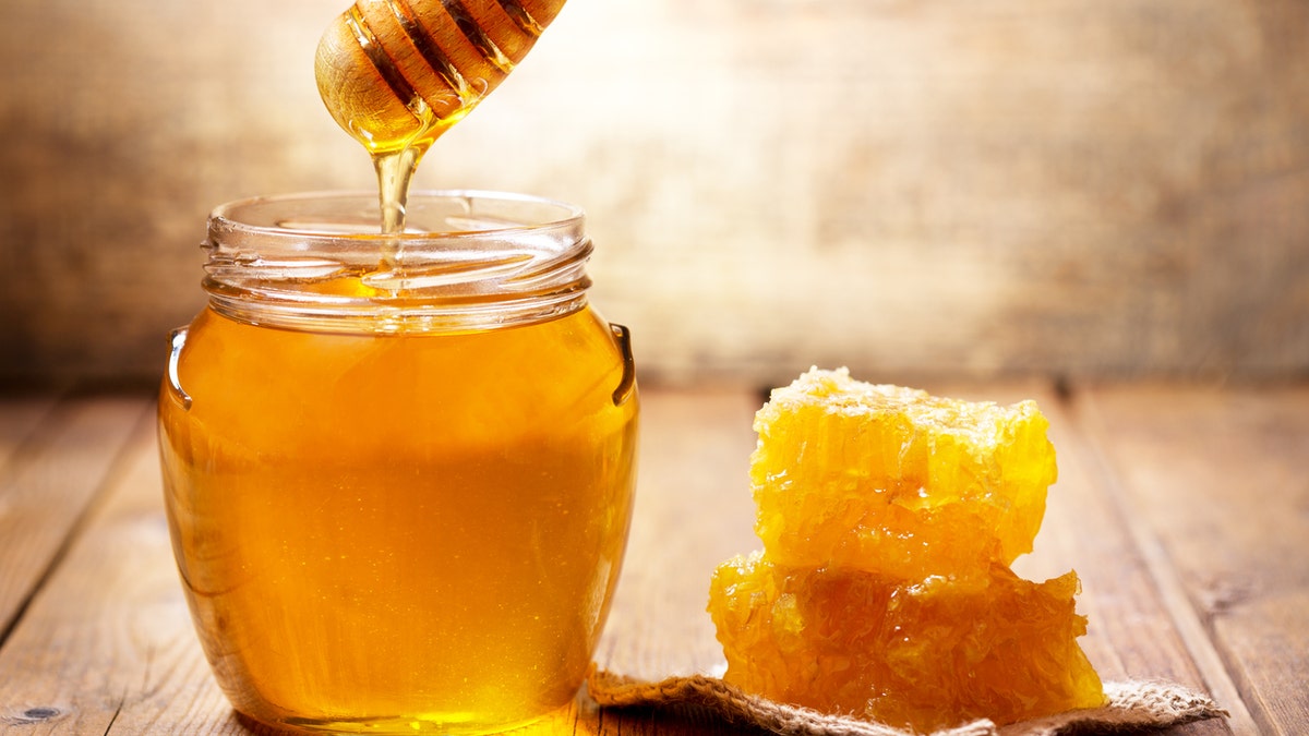 jar of honey and honeycomb