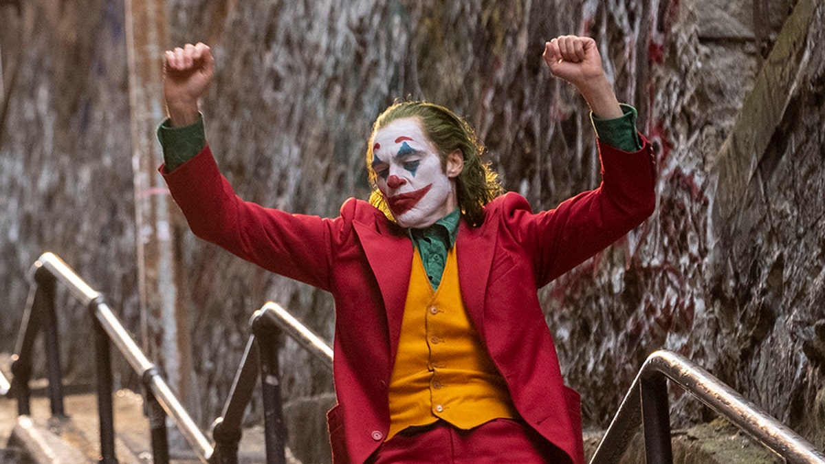 This image released by Warner Bros. Pictures shows Joaquin Phoenix in a scene from "Joker."