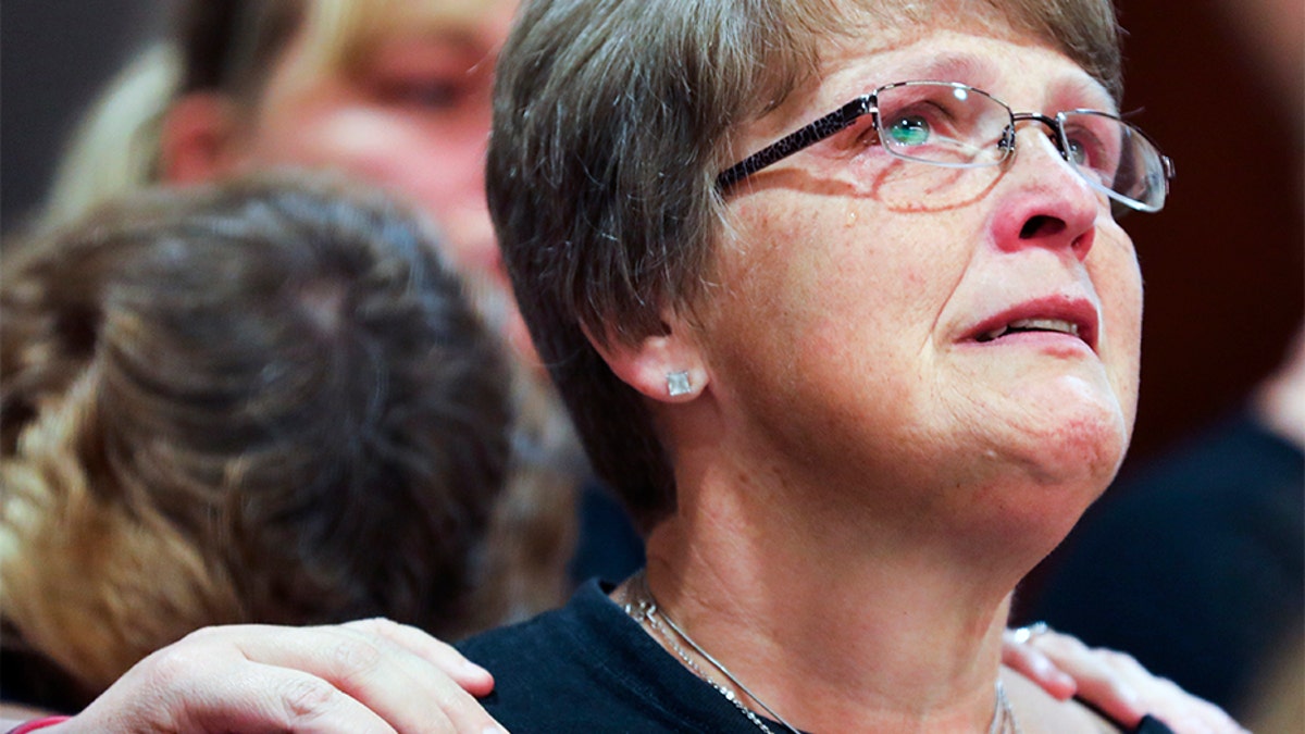 Kristine Young, mother of Ashley Young, reacts at the sentencing of Jared Chance on Thursday. (AP/The Grand Rapids Press)