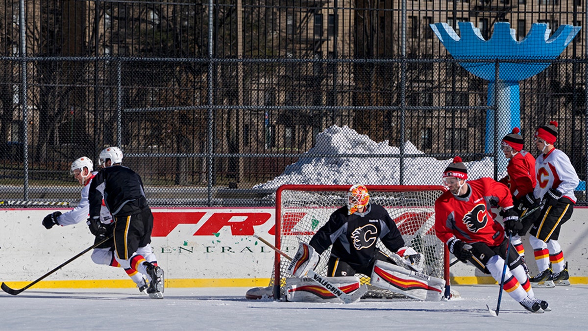 The NHL's Calgary Flames practice at Lasker Rink in New York's Central Park.