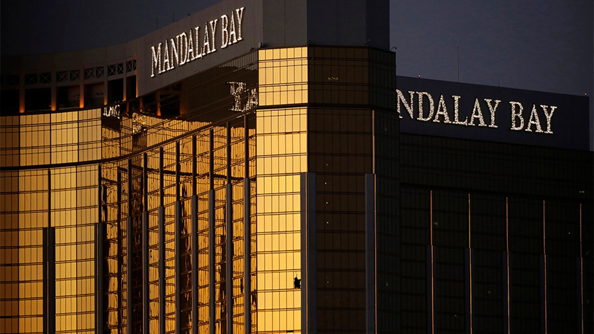 In this Oct. 3, 2017, file photo, windows are broken at the Mandalay Bay resort and casino in Las Vegas, the room from where Stephen Paddock fired on a nearby music festival, killing 58 and injuring hundreds.