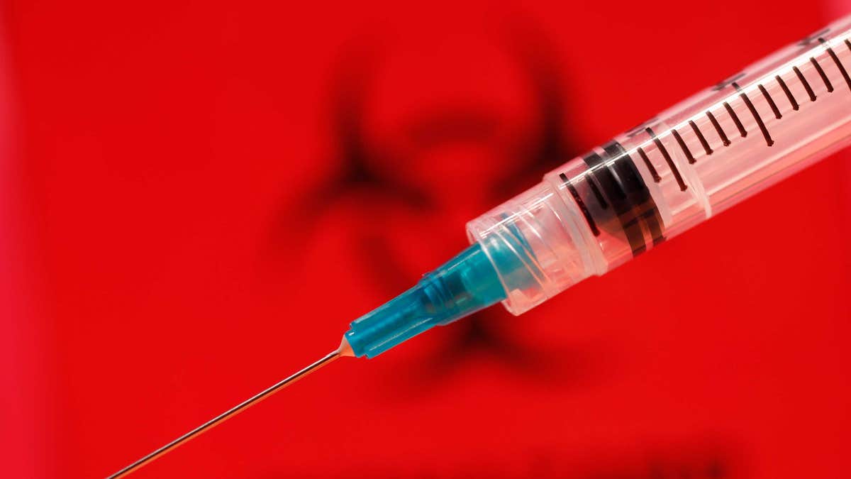 A Pakistani doctor is accused of reusing syringes on patients, leading to an outbreak of nearly 900 children and 200 adults. 