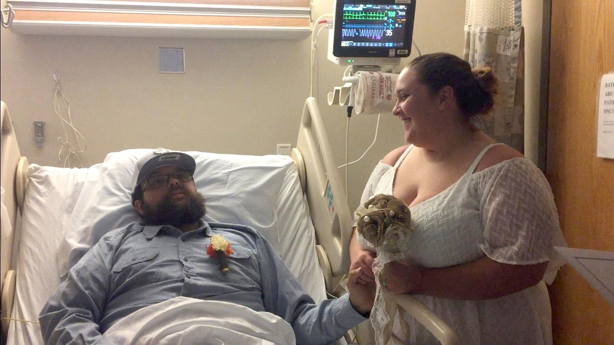 Timothy Berty, 25, and Jessica Berty, 30, got married at the hospital while he was recovering from brain surgery.