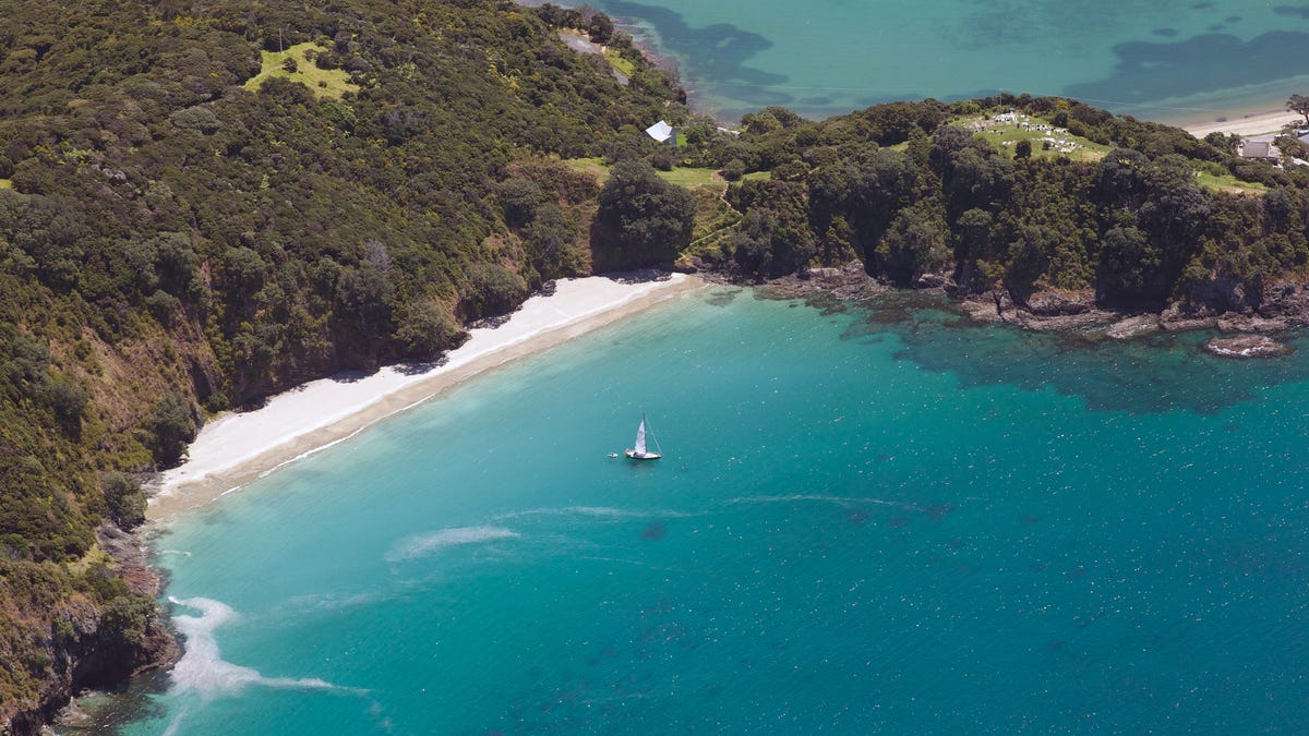 An aerial view of the Bay of Islands, North Island, New Zealand. The Bay of Islands boasts a unique coastline sheltering over 150 small islands in its arms.