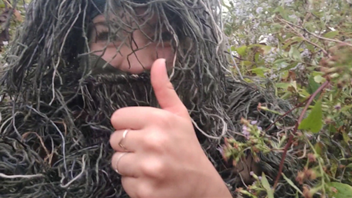 Groom-to-be Andrew Philibeck and the bride-to-be's sister, Therese, hatched a covert plan for Therese to dress up in a ghillie suit – a camouflage outfit designed to blend into outdoor elements like forests, fields and snow – to discreetly capture the big moment where Rachel would (hopefully) say “yes.”