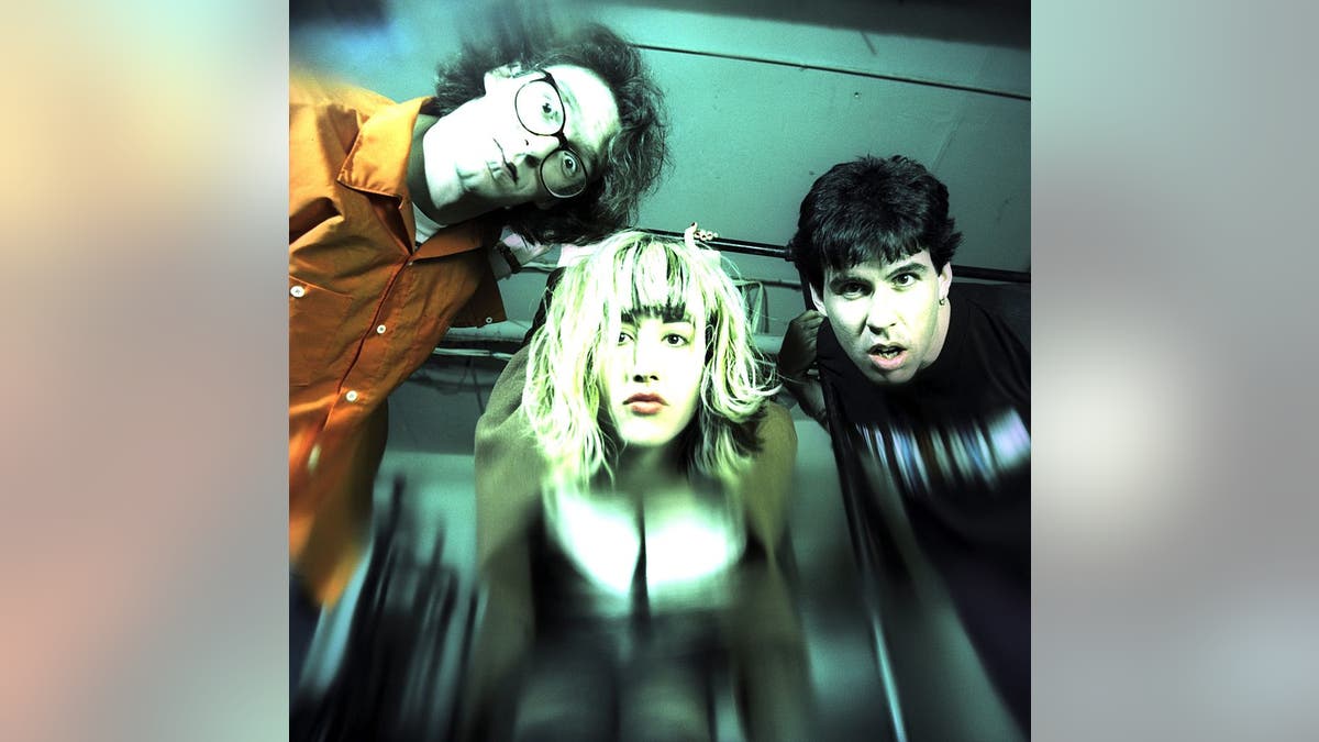 The Muffs (L - R) bassist Ronnie Barnett, lead vocalist Kim Shattuck and drummer Roy McDonald pose for an April 1995 portrait in New York City, New York. (Photo by Bob Berg/Getty Images)