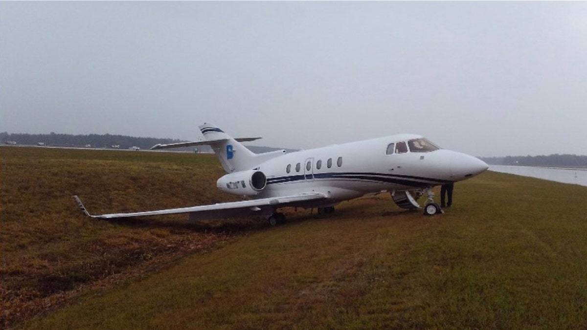The plane’s crew declared an emergency shortly before 8:30 a.m., citing trouble with the nose gear.