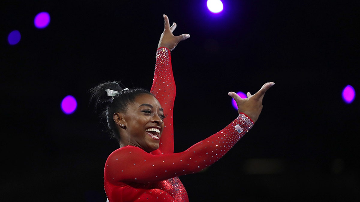 Gold medalist Simone Biles of the United States performs on the vault in the women's apparatus finals at the Gymnastics World Championships in Stuttgart, Germany, Saturday, Oct. 12, 2019. (AP Photo/Matthias Schrader)