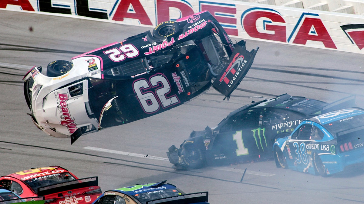 Brendan Gaughan (62) got flipped during a multi-car accident with six laps to go.