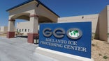 This Wednesday, Aug. 28, 2019, photo shows the Adelanto U.S. Immigration and Enforcement Processing Center operated by GEO Group, Inc. (GEO) a Florida-based company specializing in privatized corrections in Adelanto, Calif. California is banning the use of for-profit, private detention facilities, including those the federal government uses for immigrants awaiting deportation hearings. Gov. Gavin Newsom announced Friday, Oct. 11, 2019 he had signed a measure into law that helps fulfill his promise to end the use of private prisons.(AP Photo/Chris Carlson)