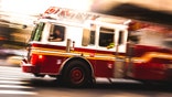 Fire department truck in emergency in New York streets.