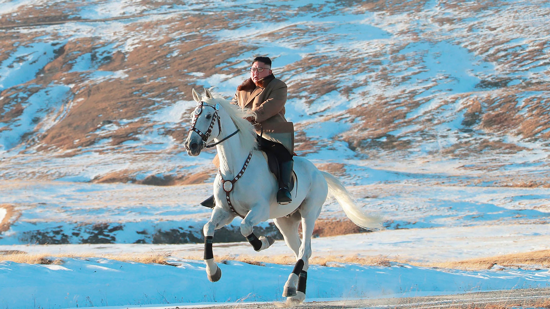 North Korean leader Kim Jong Un rides a white horse to climb Mount Paektu, North Korea, Oct. 16, 2019. 