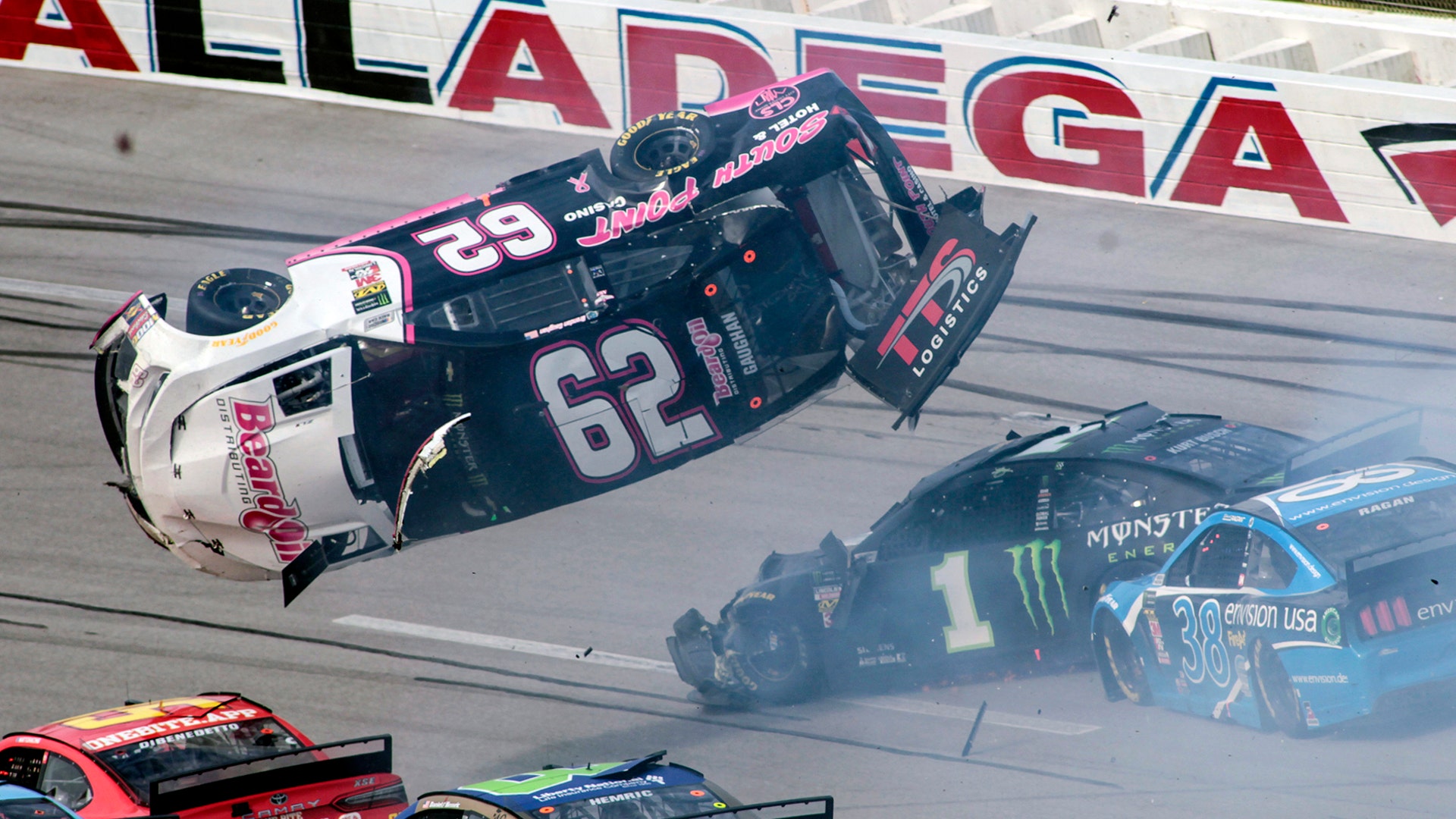 Brendan Gaughan flips in turn 3 during a NASCAR Cup Series auto race at Talladega Superspeedway, Oct 14, 2019. 