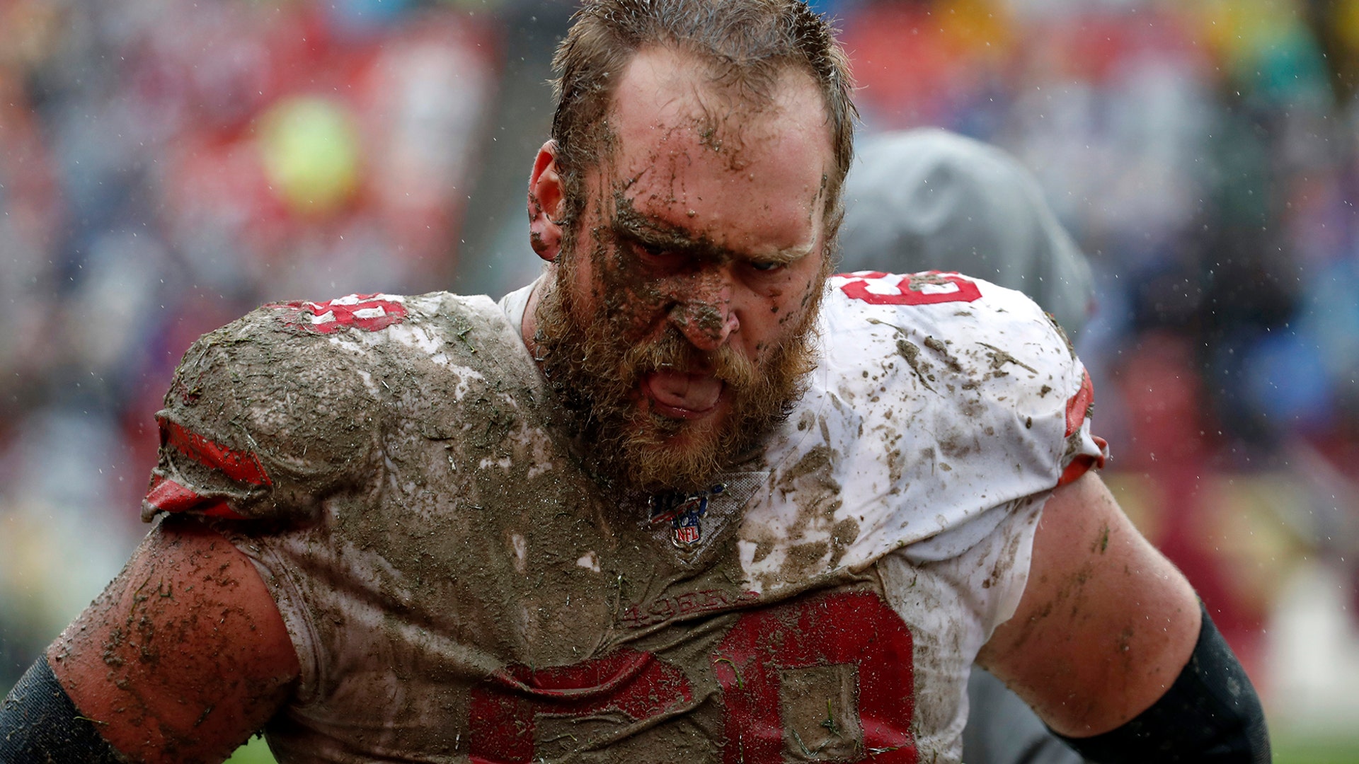 San Francisco 49ers offensive guard Mike Person walks the sidelines in the second half of an NFL football game against the Washington Redskins in Laurel, Maryland, Oct. 20, 2019. 