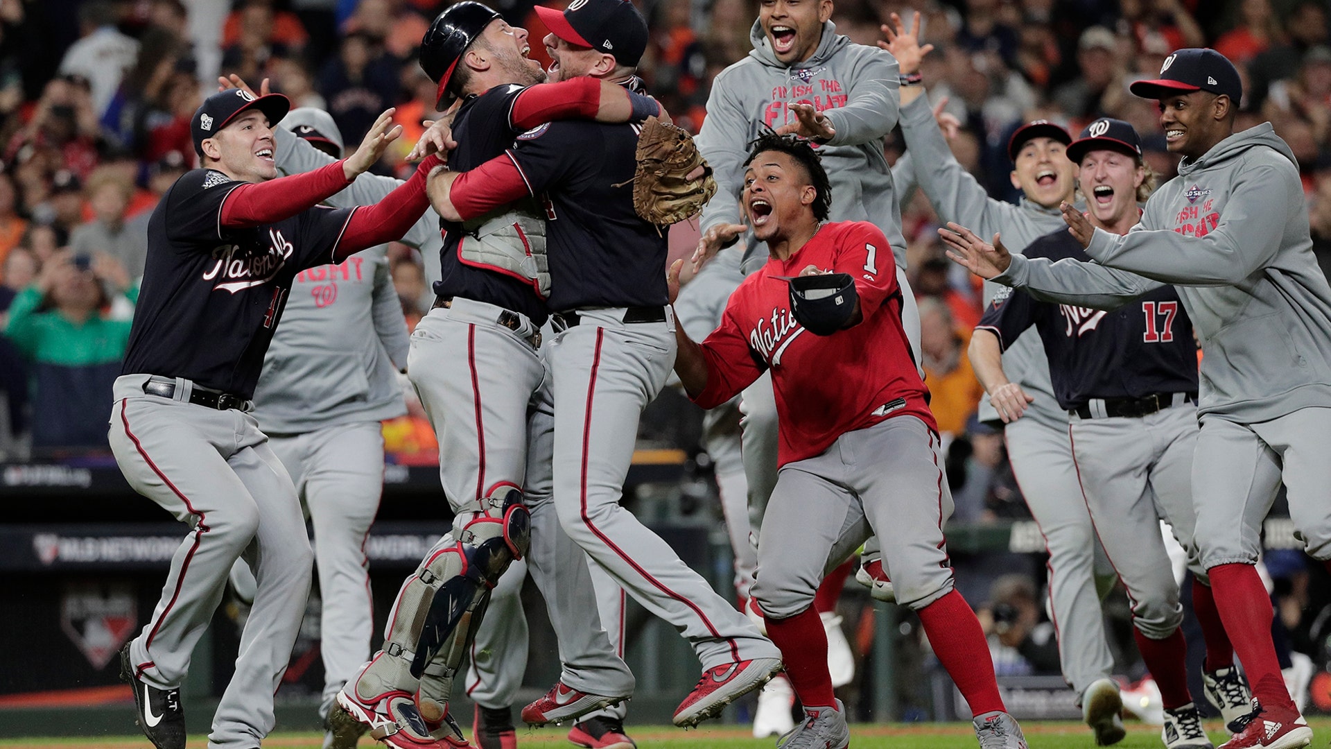 Washington Nationals' celebrate after defeating the Houston Astros to win the World Series in Houston,  Oct. 30, 2019. 