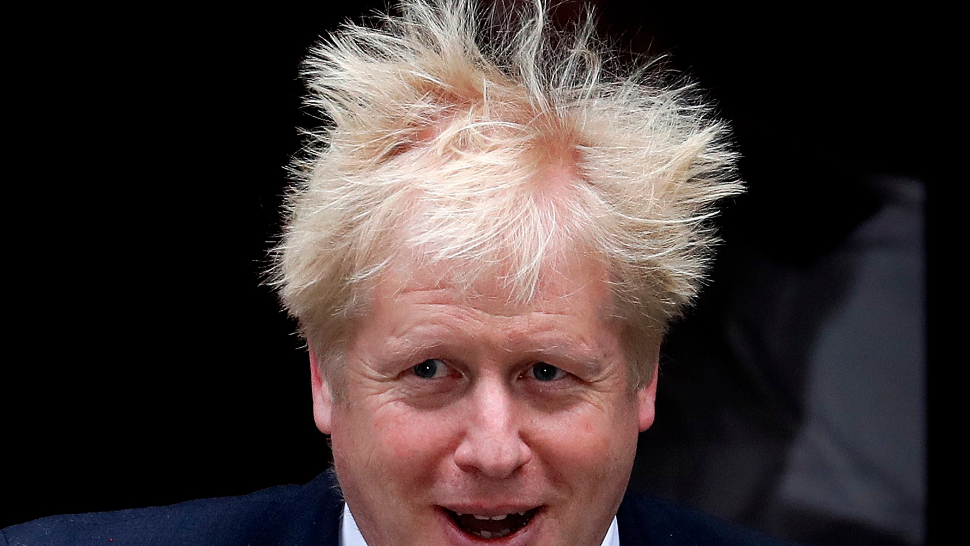 Britain's Prime Boris Johnson leaves 10 Downing Street to attend the weekly Prime Ministers' questions session, in parliament in London, Oct. 23, 2019. 