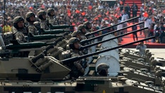 China boosts military spending as GOP demands Biden do the same