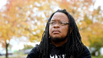 Wisconsin school guard fired over racial slur gets job back, union official says