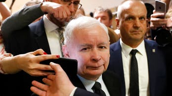 Poland’s ruling conservative party declares victory for another four years