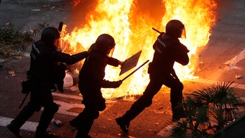 Pro-independence protests in Barcelona spark clashes with police, violence