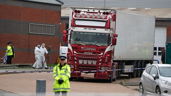 British police arrest fourth person in connection to gruesome truck deaths; some victims may have been Vietnamese