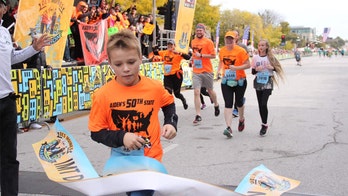 Illinois boy, 11, breaks world record, runs half marathon in all 50 states