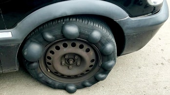 Cops pull over car with bizarre bubbly tire