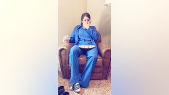 Photo of emotional nurse after 'particularly hard day' goes viral