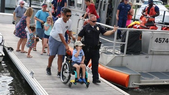 Florida boy, 5, battling aggressive brain cancer gets to patrol with Coast Guard, police